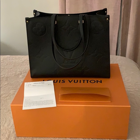 Louis Vuitton Handbags - NWT Louis Vuitton Black Leather on the Go Tote